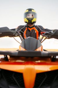 rider-helmet-equipment-quad-bike-front-view-closeup-male-quadbike-driver-atv-riding